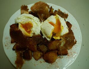 Poached eggs with cecina